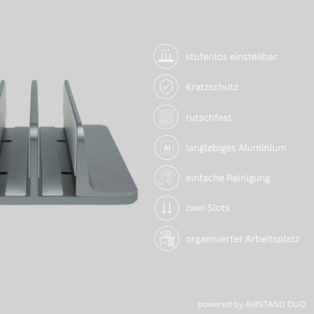 AIRSTAND DUO Laptop- und Tablet-Ständer mit stufenlos einstellbaren Slots, Kratzschutz, rutschfestem Silikonboden und langlebigem Aluminium. Leicht zu reinigen, bietet zwei Slots für optimale Organisation am Arbeitsplatz. Text: „stufenlos einstellbar, Kratzschutz, rutschfest, langlebiges Aluminium, einfache Reinigung, zwei Slots, organisierter Arbeitsplatz“.