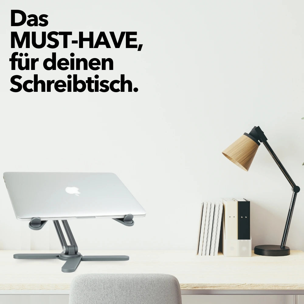 Der XSTAND Laptophalter auf einem Schreibtisch, kombiniert mit minimalistischer Einrichtung – ein Must-have für ergonomisches Arbeiten.